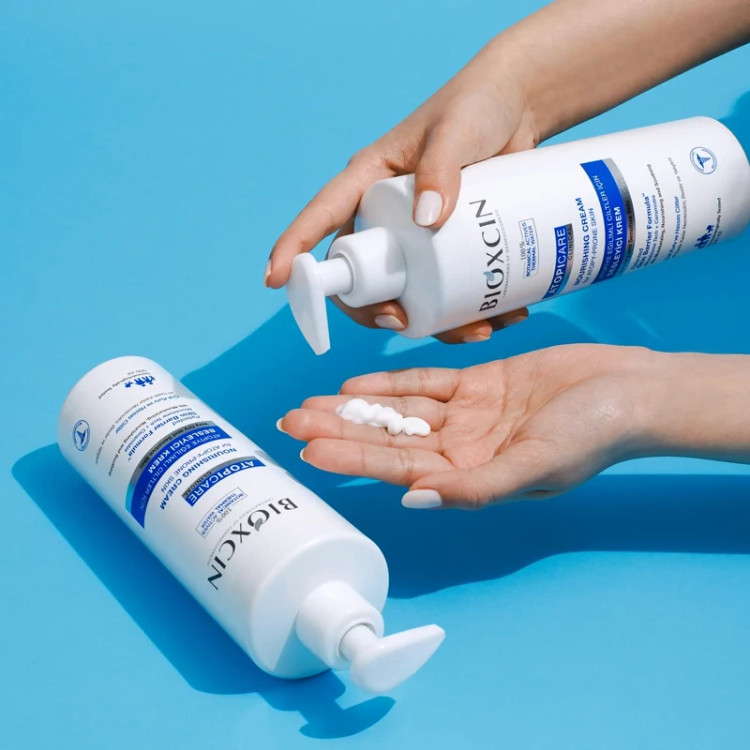 کرم مرطوب کننده صورت و بدن بیوکسین BIOXCIN مناسب پوست های خشک و حساس حجم 500 میل