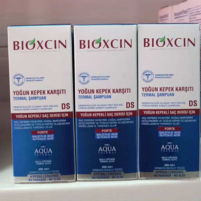 شامپو ضد شوره و بدون سولفات  بیوکسین مدل آکوا حجم 200 میل BIOXCIN